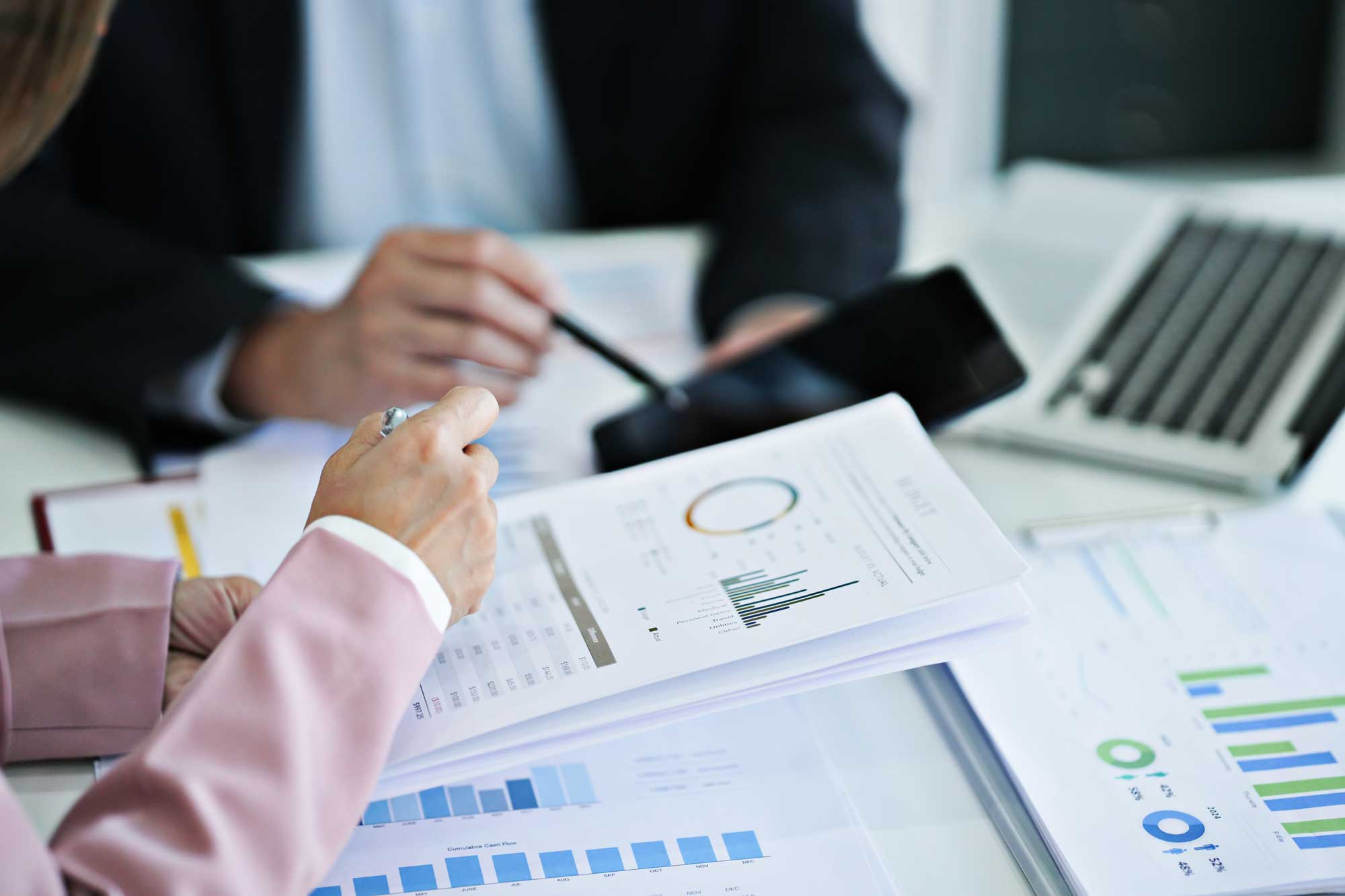 professionals discussing financial data